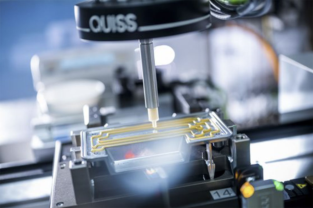 1649222953 Charged EVs Scheugenpflug integrates inspection systems into its dispensing