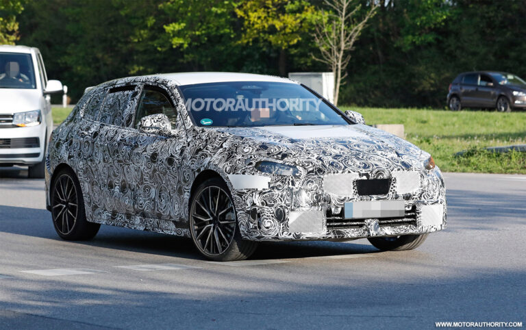 1651573207 2023 BMW M135i Hatchback spy shots Tweaked hot hatch spotted