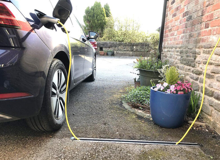 1655321472 Charged EVs Low tech Charge Cable Channel could be a