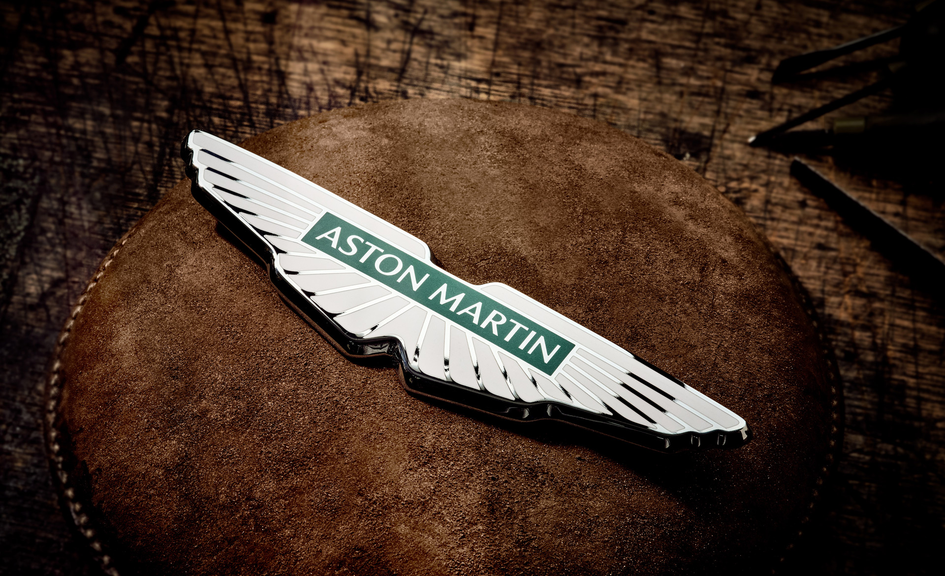 Aston Martin revises winged badge for new era