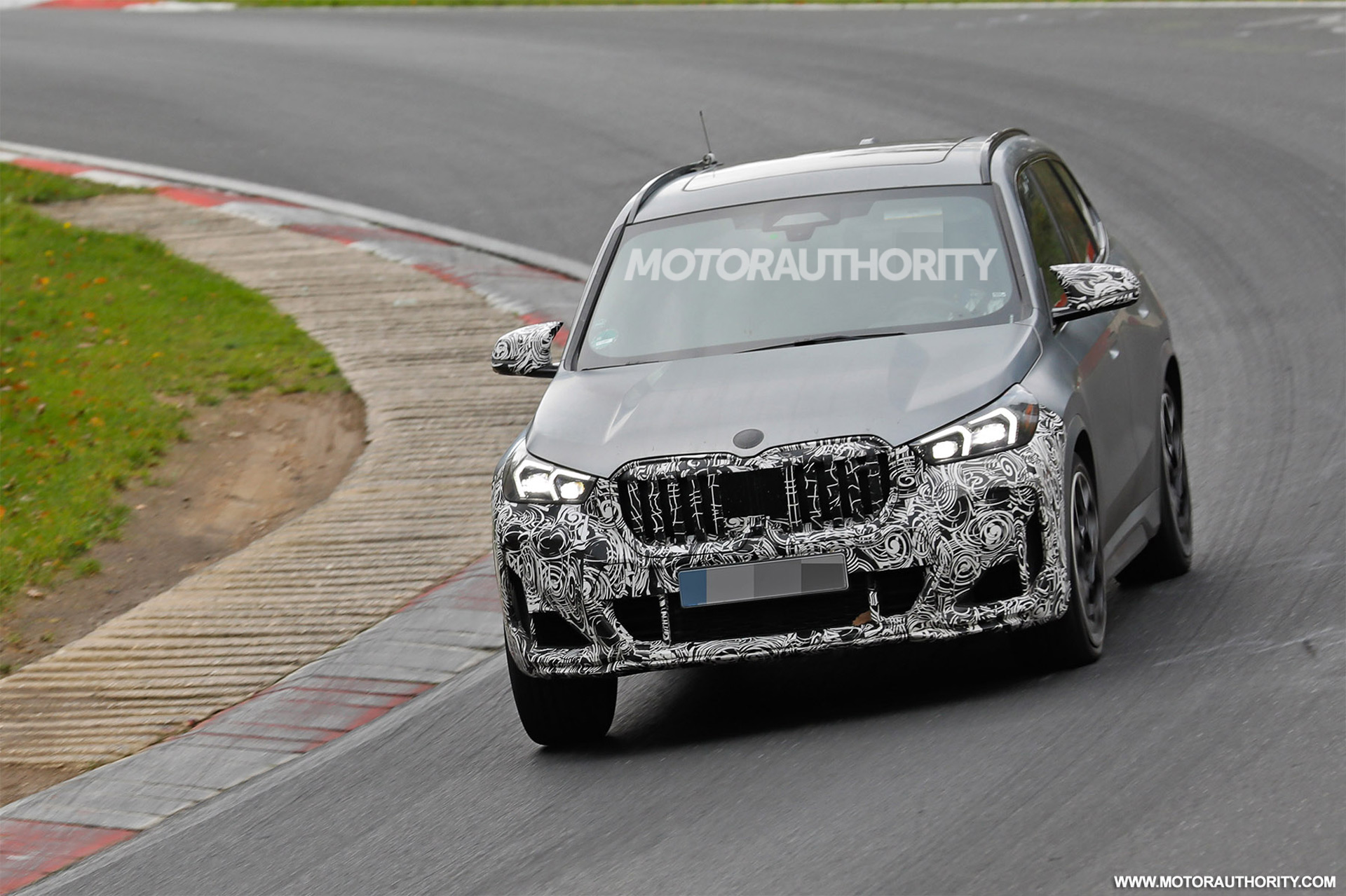 1668021199 2023 BMW X1 M35i spy shots and video