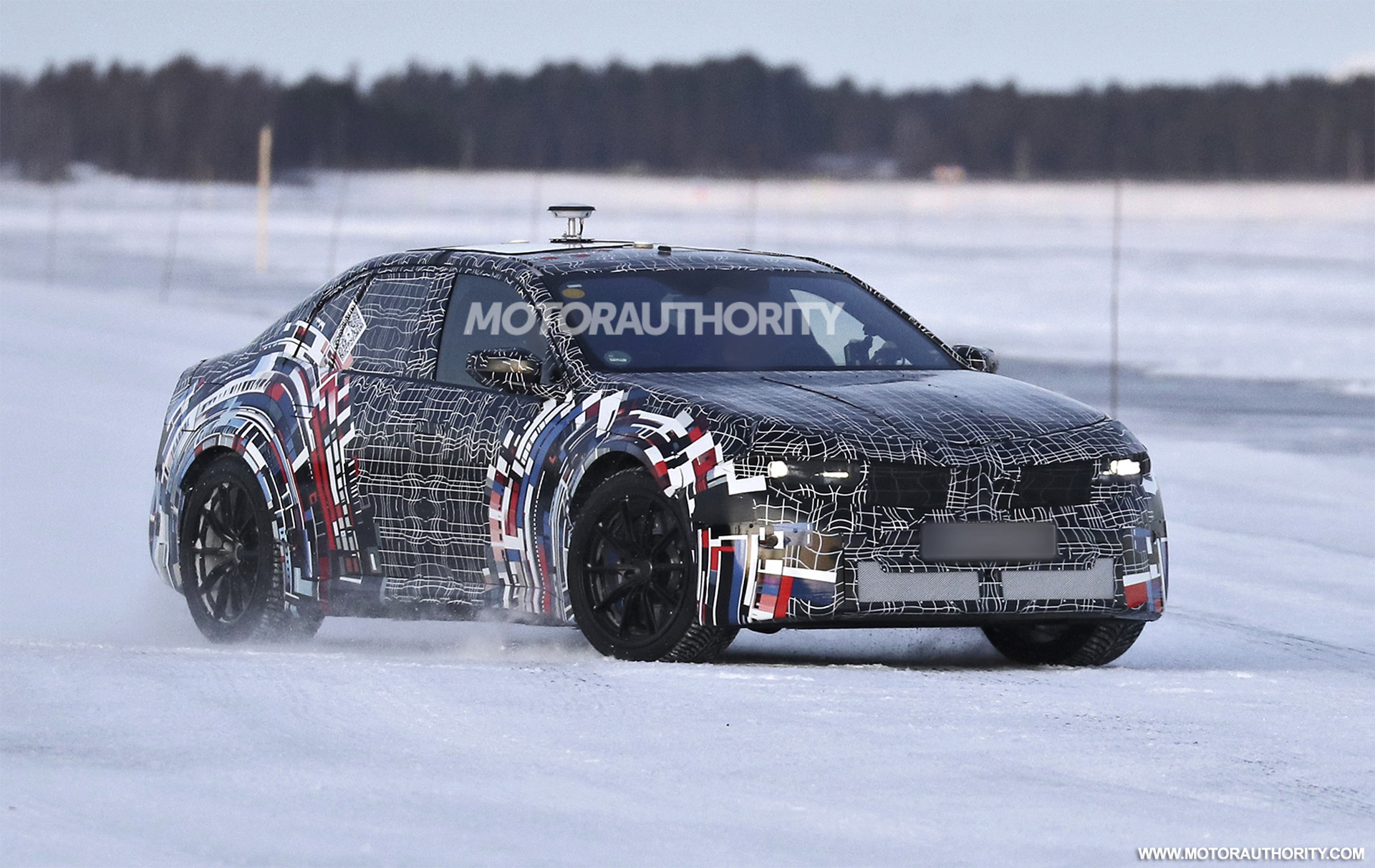 1740729720 2028 BMW M3 EV caught on video with a quad