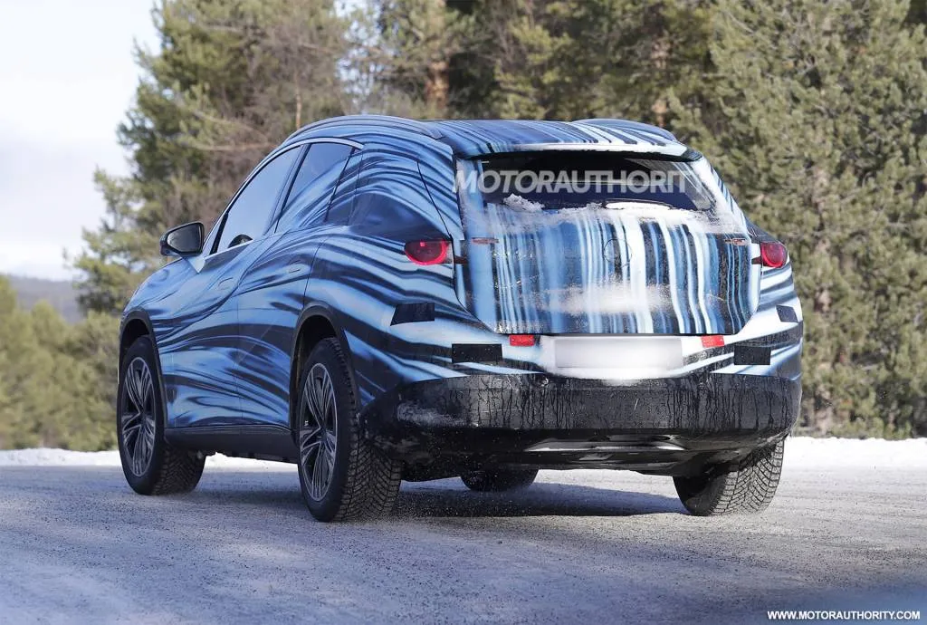 2027 Mercedes-Benz GLC-Class EV Spy Shots photo over a balance sheet
