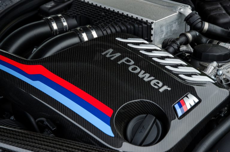 A 2015 BMW M4 engine bay, similar to the parts used for cooling a powerful AMD CPU
