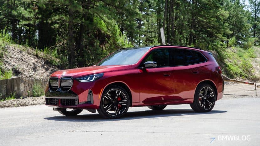 2025 BMW X3 M50 FIRE RED side view