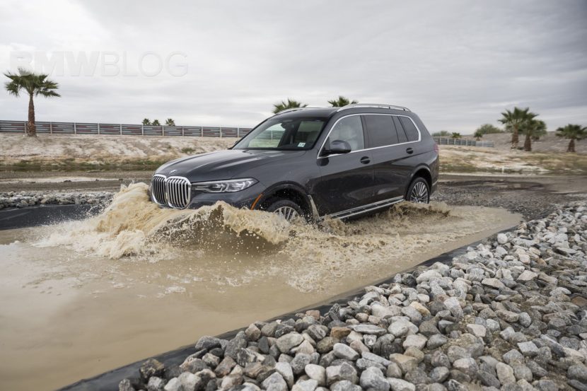 BMW X7, which goes through water in the field