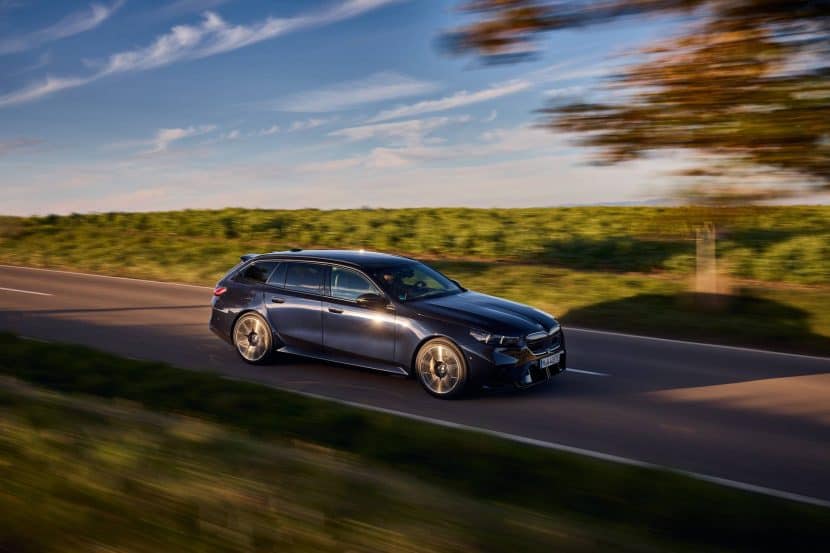 2025 BMW M5 Tour in Frozen Black drive in the City Street