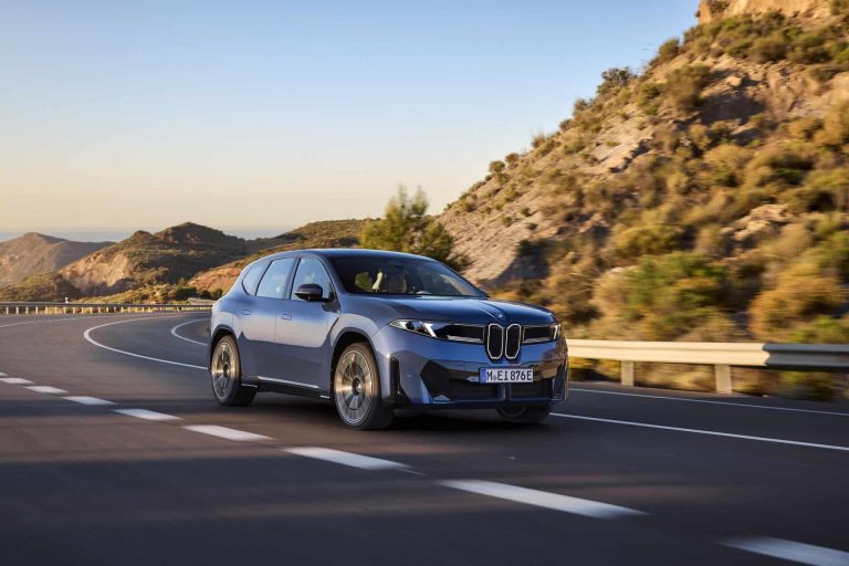 2026 BMW IX3 driving on the road