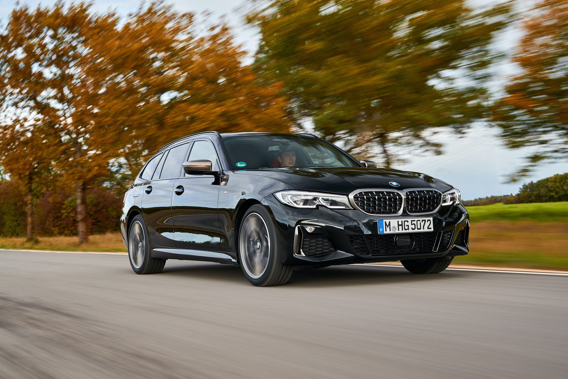 BMW M340d Touring driving on the road