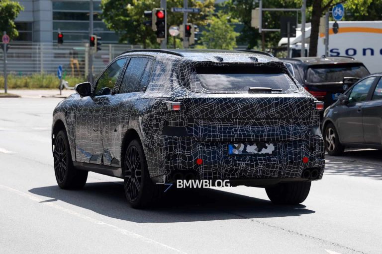 2027 BMW X5 rear-end showing the split tailgate