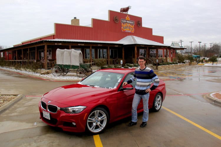 Driver with his 2014 BMW 328d sedan
