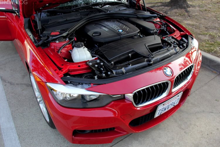 The engine compartment of the BMW 328d is powered by a diesel engine