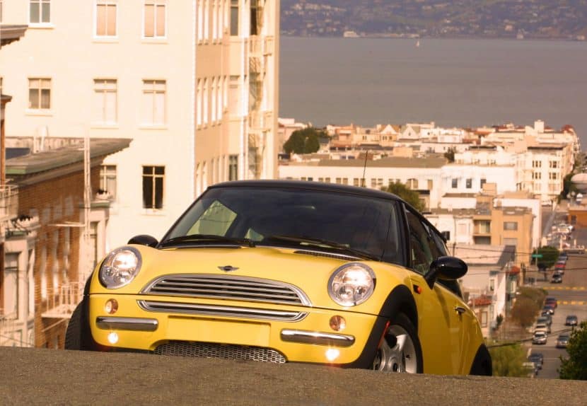 The first generation R50 MINI Cooper drives through the streets of San Francisco during the relaunch in the early 2000s